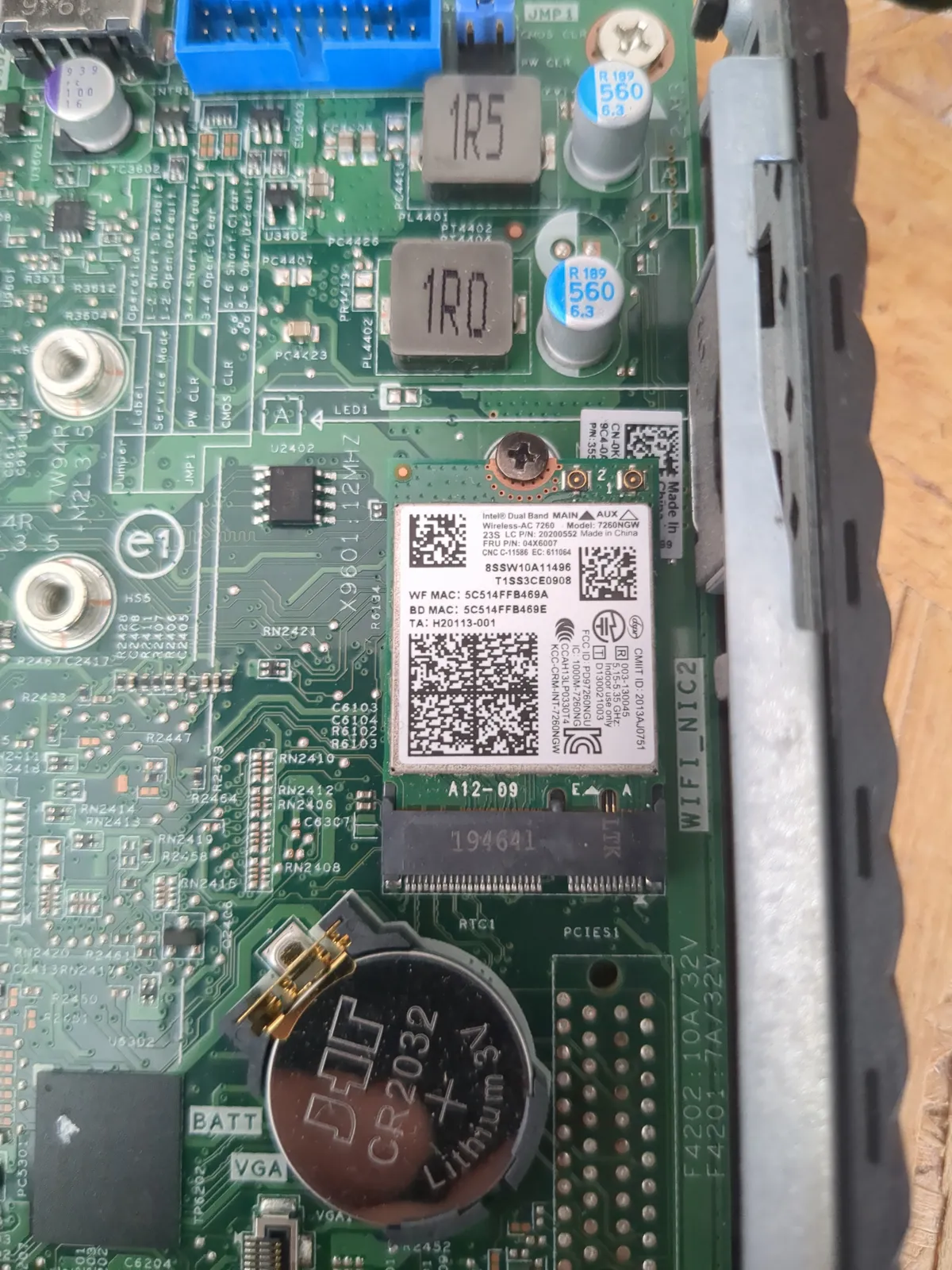 Wifi card in its new home — full of naive hope.