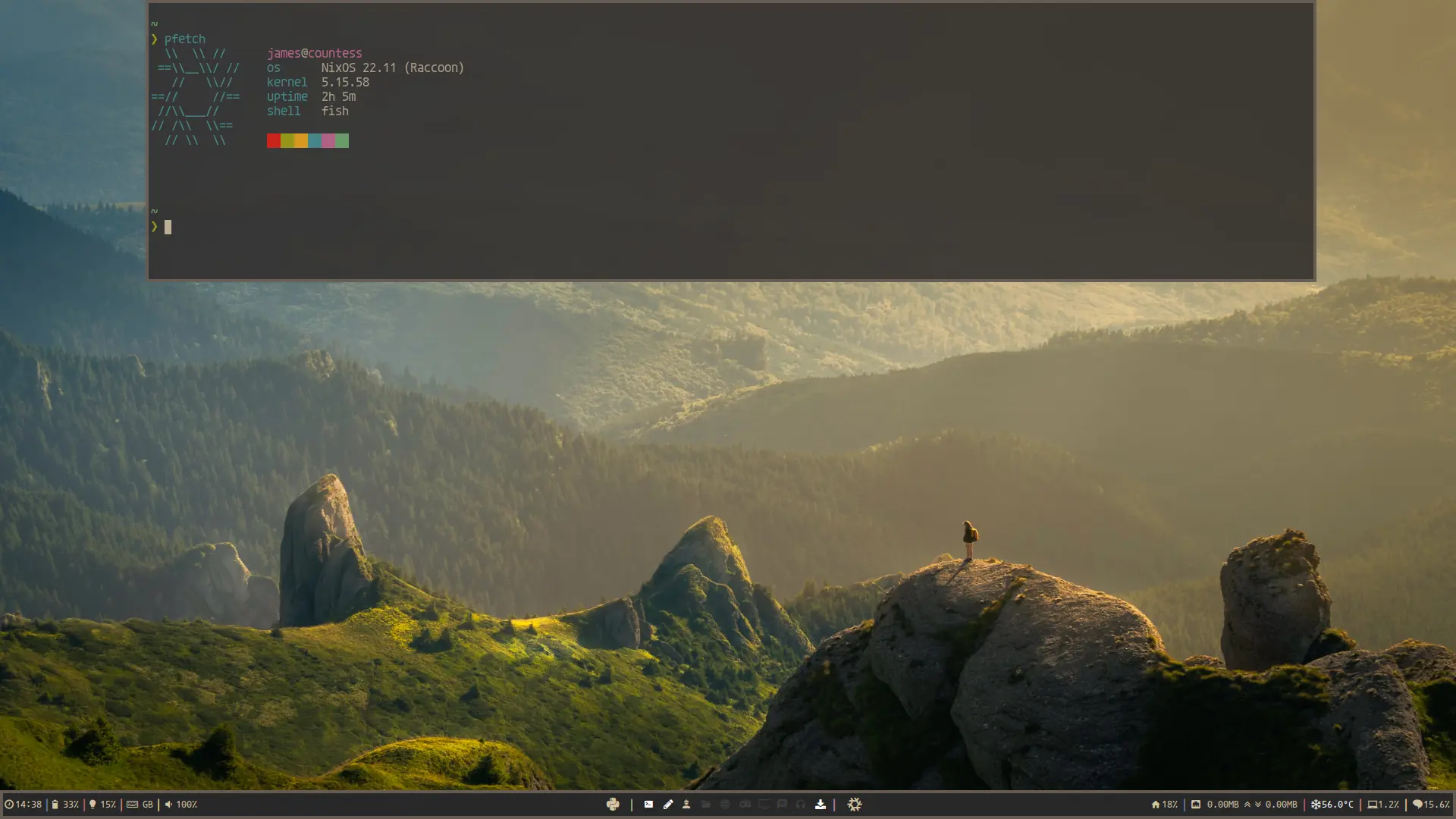 Transparent kitty dropdown terminal running pfetch over a mountain wallpaper